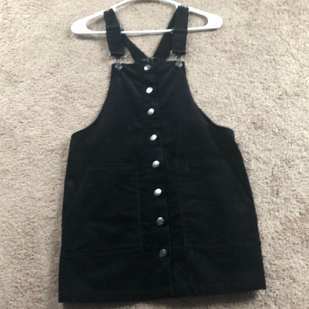 black overall dress